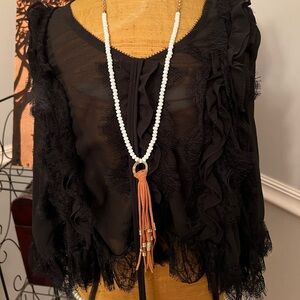 Long faux light brown leather tassel! Gorgeous milk glass faux beads!